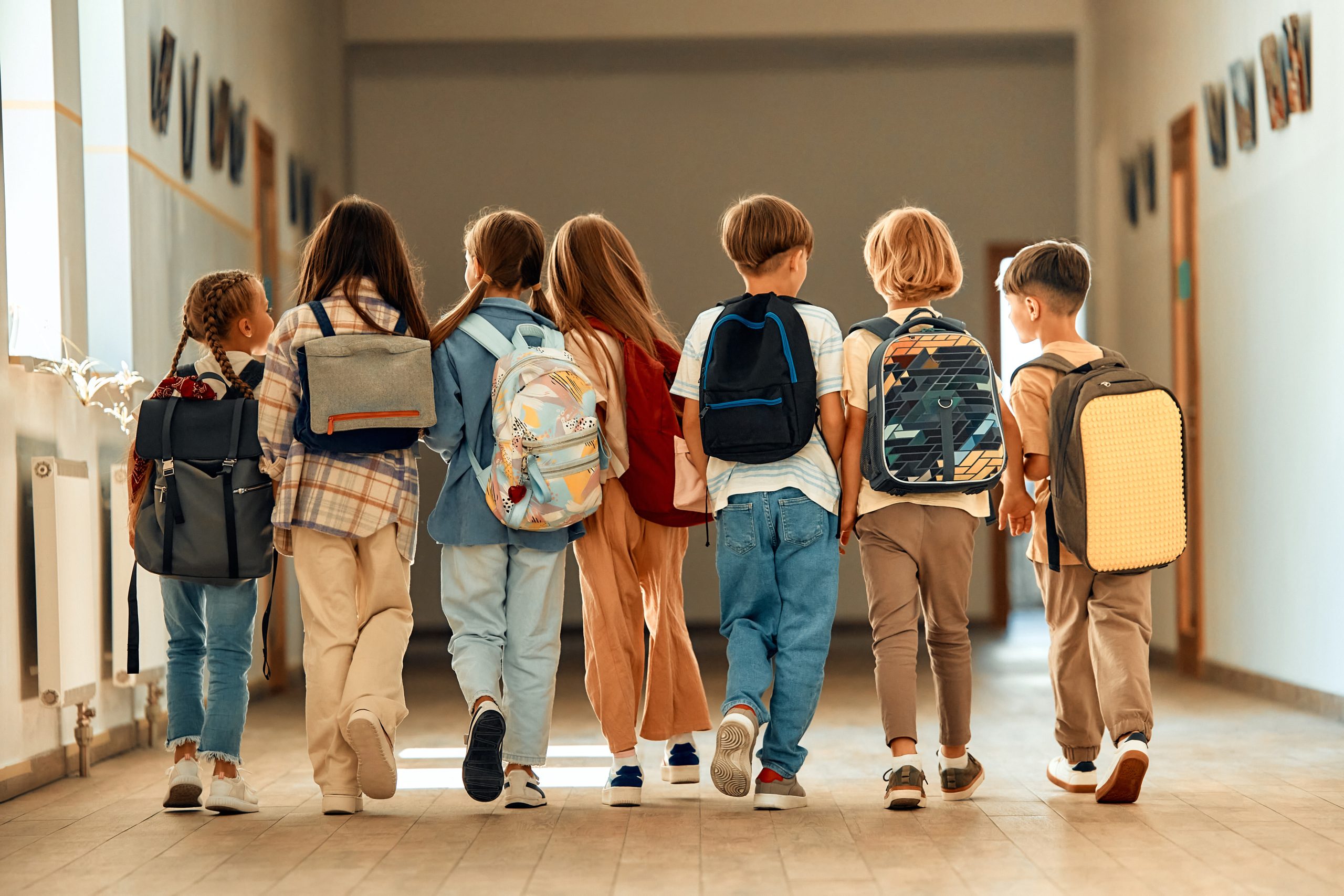 children learning in a school protected by HQE Systems and their integration of AI Artificial Intelligence and ML Machine Learning.