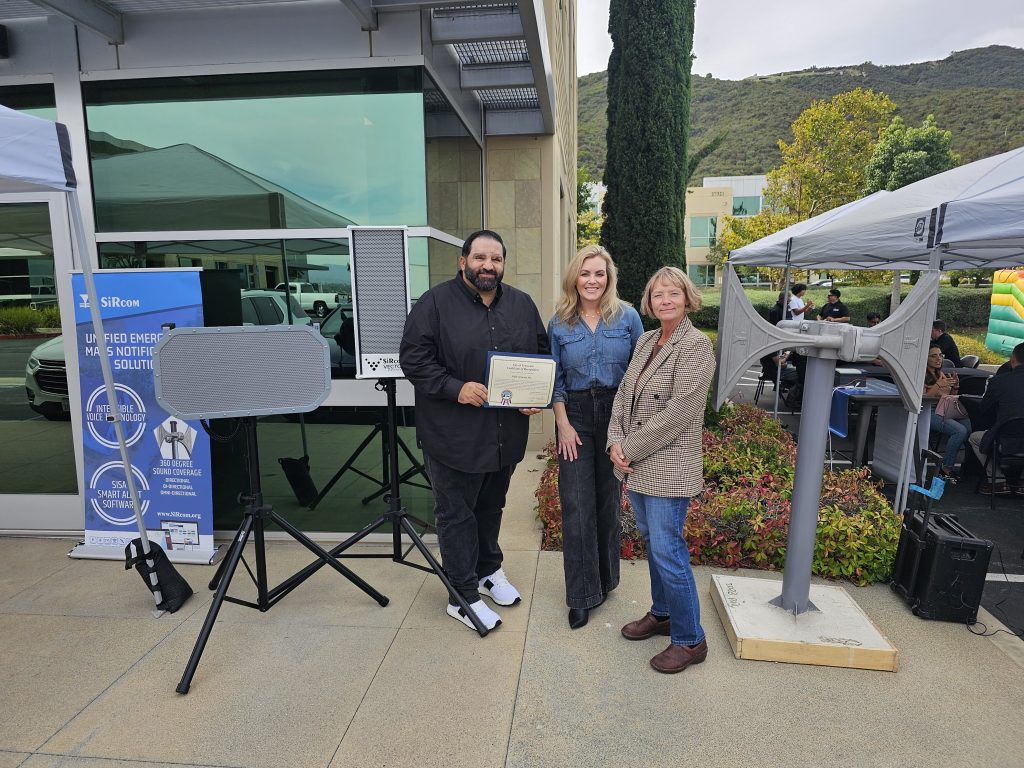 Mr. Qais Receiving Award at HQE Systems for artificial intelligence and machine learning technology with integration solutions.