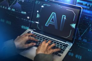 working on a laptop connect to Artificial intelligence (AI) integrated by HQE Systems for life saving disaster planning.